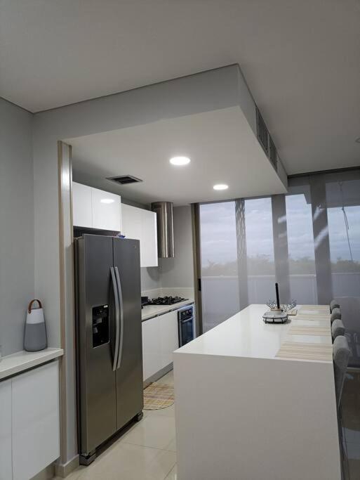 Apartamento en piso 20 con vista espectacular al mar, Sierra Nevada y Jardín privado en Santa Marta Exterior foto